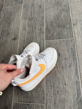 Nike Kids White Sneakers with Orange Swoosh - Velcro Strap